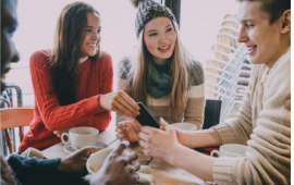 group of teens laughing 