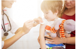 child being vaccinated 